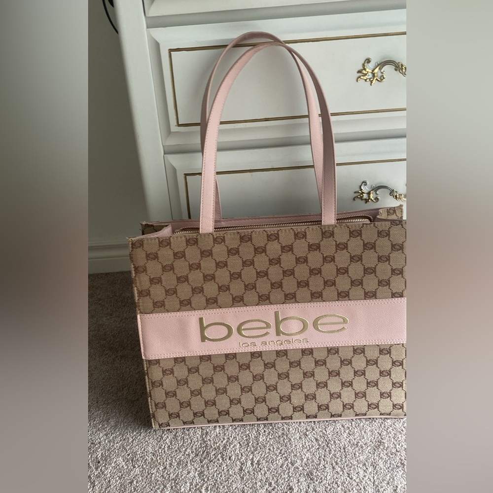 bebe tote bag never used. selling because i got a new bag
